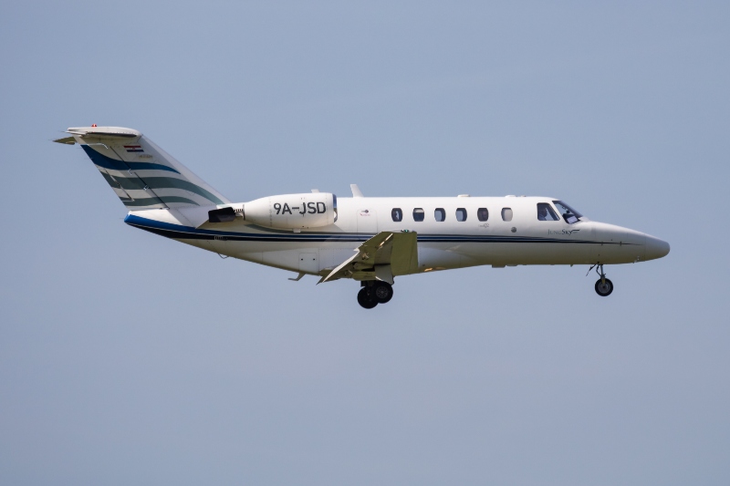 a cessna citation cj1 with landing gear down