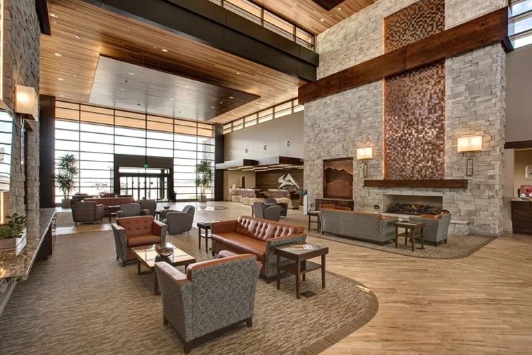 Interior of an fbo terminal, decorated in a modern wood and stone motif.